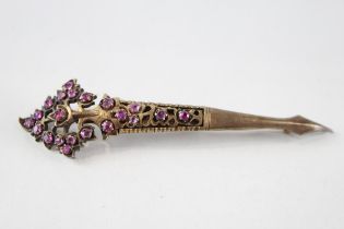 A silver ruby set Kondakoora brooch (13g)