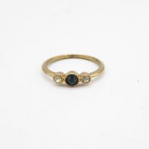 Unhallmarked testing as 9ct gold diamond and sapphire small ring size G .6g