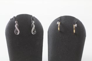 2x 9ct gold diamond & black gemstone earrings (2.6g)