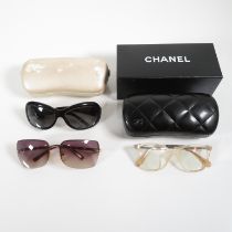 Collection of Designer Chanel Glasses x 3 // Items are in previously owned condition Signs of