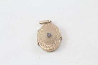 9ct gold diamond locket (1.5g)