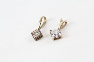 2x 9ct gold diamond pendants (0.8g)