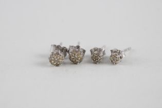 2 x 9ct white gold diamond stud earrings (1.4g)