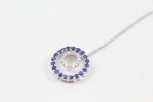 10kt white gold sapphire and diamond double halo pendant necklace (2g)