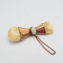 9ct rose gold kangaroo tooth and opal brooch - 65mm length (10g)