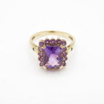 HM 9ct gold dress ring with large purple centre stone (3g) Size O