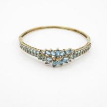 HM 9ct gold bangle with blue stones (13.4g)