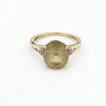 HM 9ct gold dress ring with smoky centre stone (2.6g) Size P
