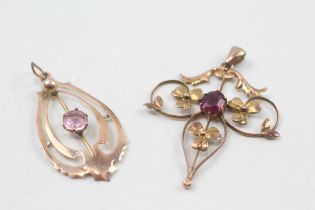 2x 9ct gold purple & pink paste pendants (2.5g)