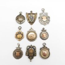 Selection of silver and gold watch fobs 97g