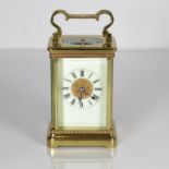 A midsize carriage clock 120mm x 70mm. Clock requires full service //