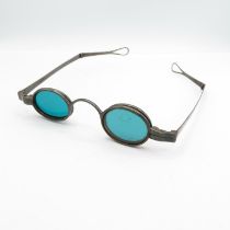 Set of antique spectacles with folding arms