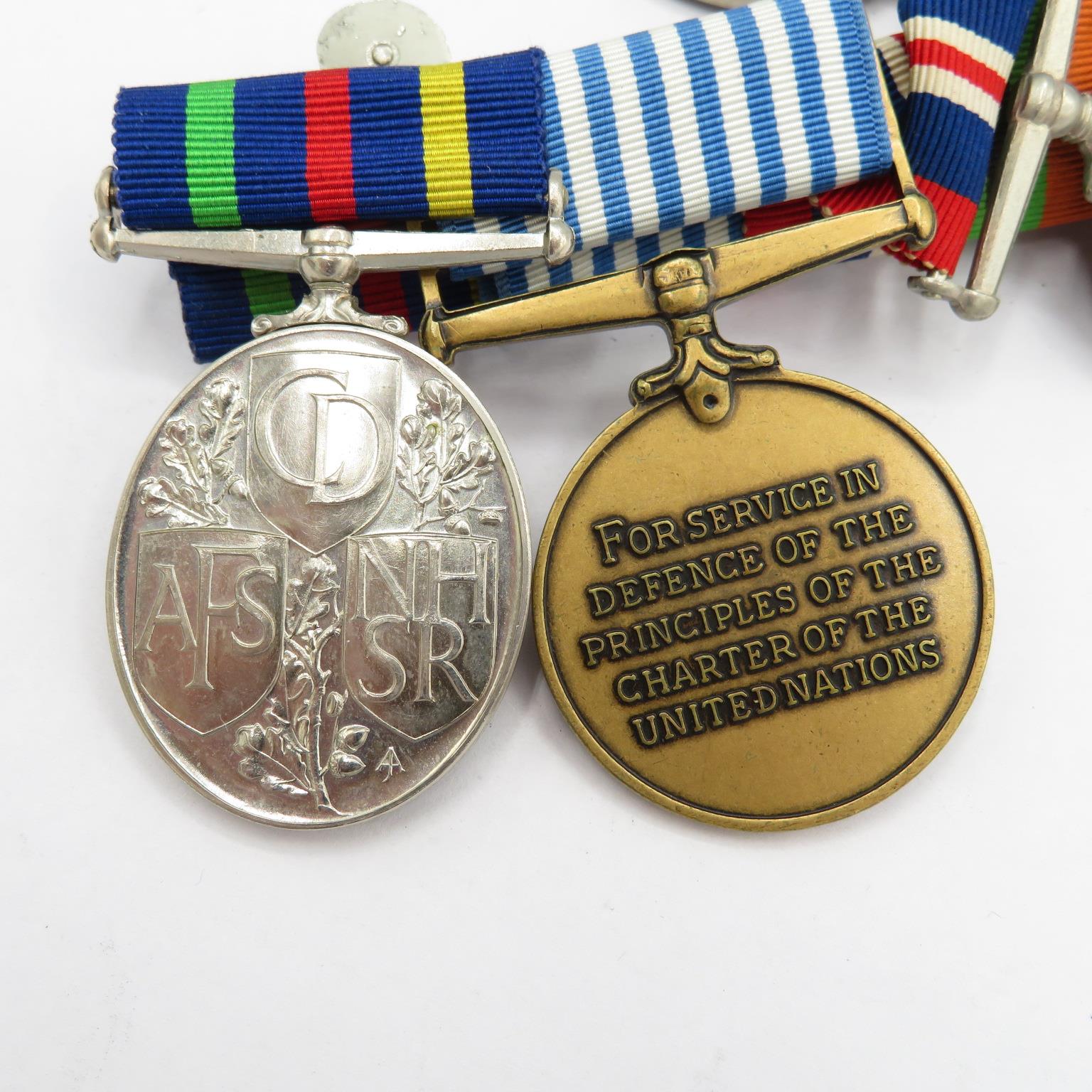 Selection of 7 medals all on one bar including Korea medal. - Image 7 of 7