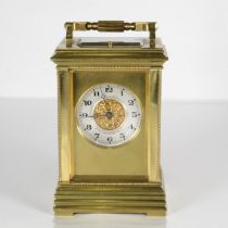 A large carriage clock 150mm x 99mm with full chiming mechanism. Clock requires full service //