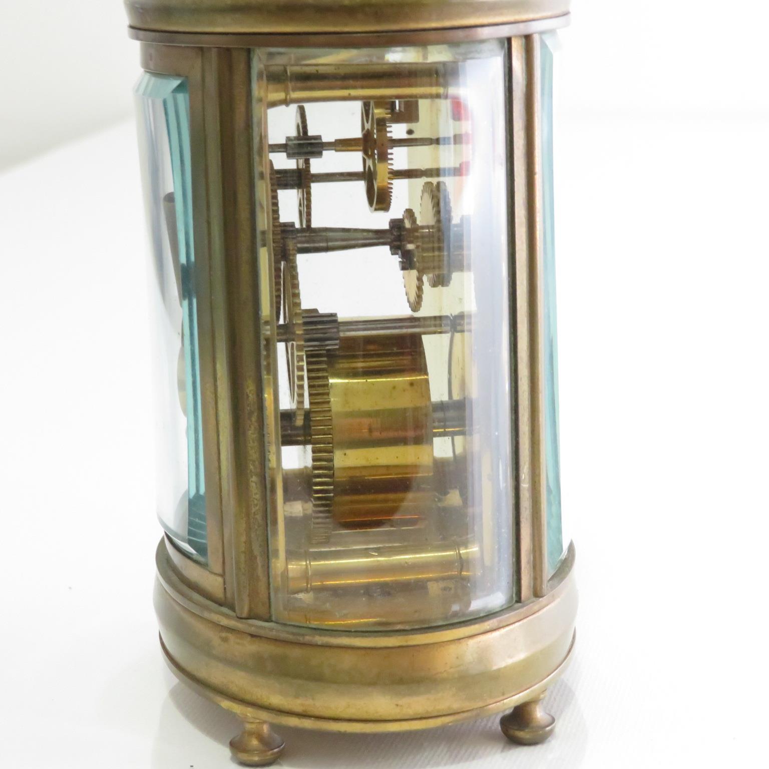 A midsized oval carriage clock. Problem with winding. Sold as spares or repairs. 110mm x 90mm // - Image 5 of 6