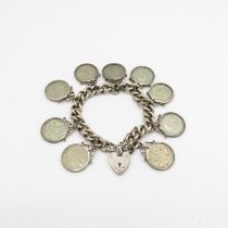 a silver coin bracelet 69.5g