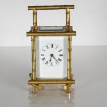 A large chiming carriage clock with French movement and bamboo design. Clock requires full
