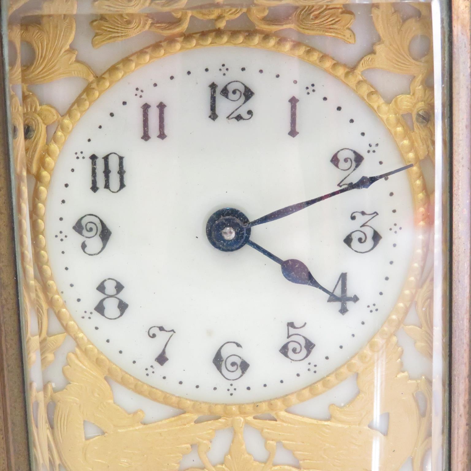 A midsized oval carriage clock. Problem with winding. Sold as spares or repairs. 110mm x 90mm // - Image 2 of 6