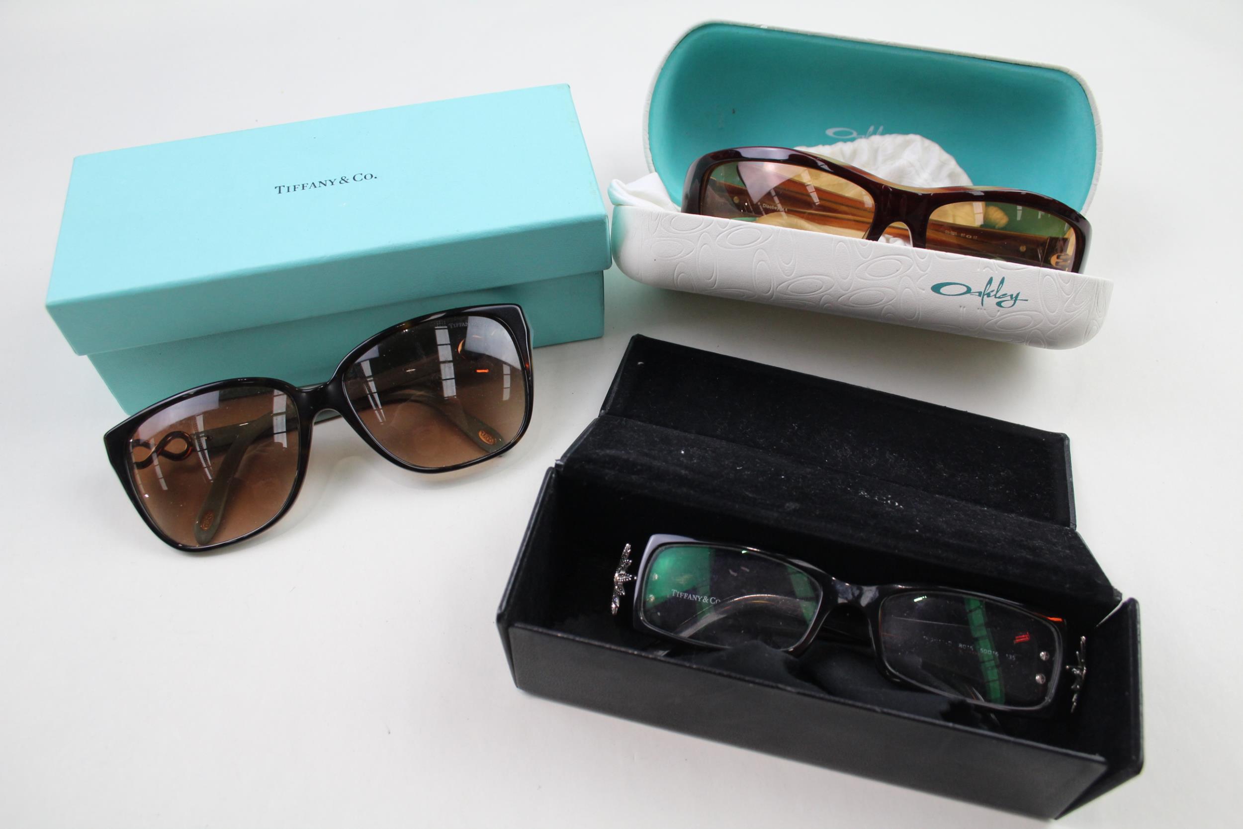 3 x Designer Sunglasses & Prescription Glasses Inc Tiffany & Co, Oakley, Case // Items are in