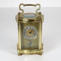 A French carriage clock with underbell. Clock is overwound and requires full service. 120mm x