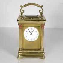 A large chiming carriage clock 150mm x 100m. Clock requires full service //