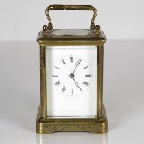 A midsize carriage clock 110mm x 70mm. Clock requires full service //