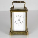A midsize carriage clock 110mm x 70mm. Clock requires full service //