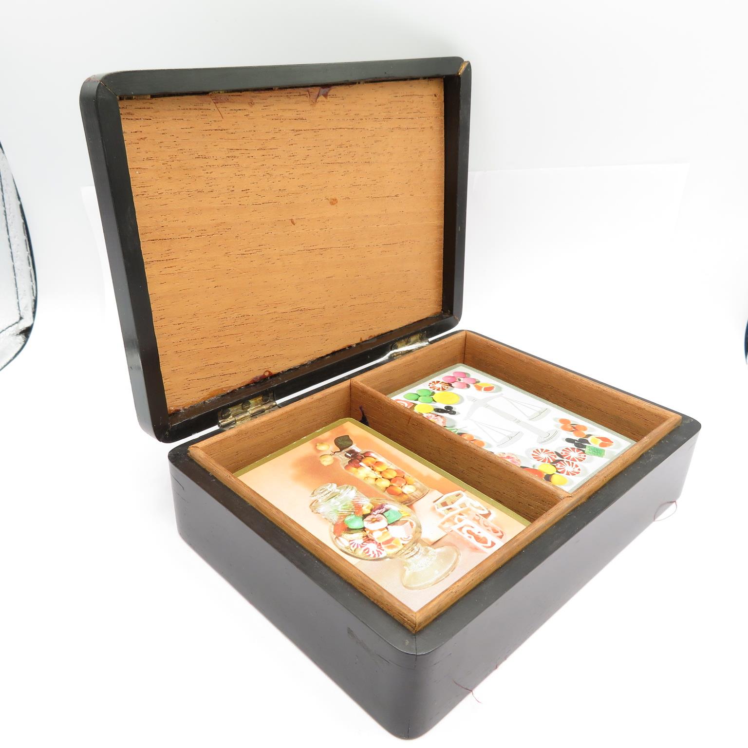 An antique ebony box with silver inlay containing packs of cards box measures 160mm x 120mm //