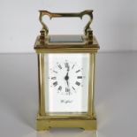 A Woodford midsized chiming carriage clock with 13 unadjusted jewel. 120mm x 80mm. Fully running //