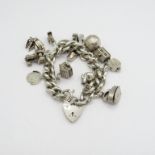 a silver charm bracelet 78g