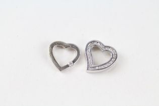 2x 9ct white gold diamond heart shaped pendants (2.8g)