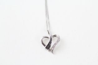 9ct white gold diamond & enhanced black diamond heart shaped pendant & chain (1.9g)
