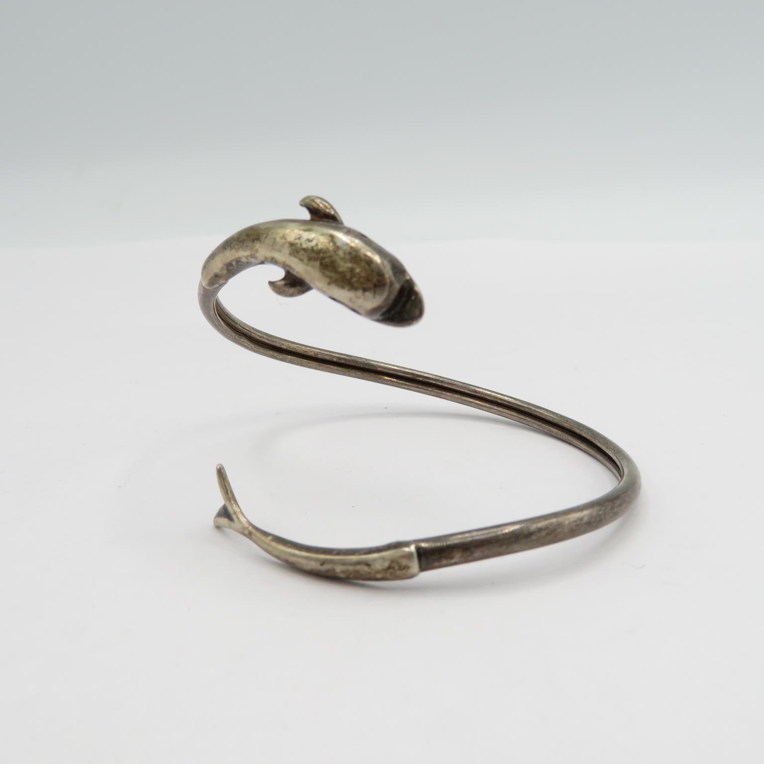 2 silver bangles one daisy ending and one dolphin ending 20.5g - Image 2 of 7