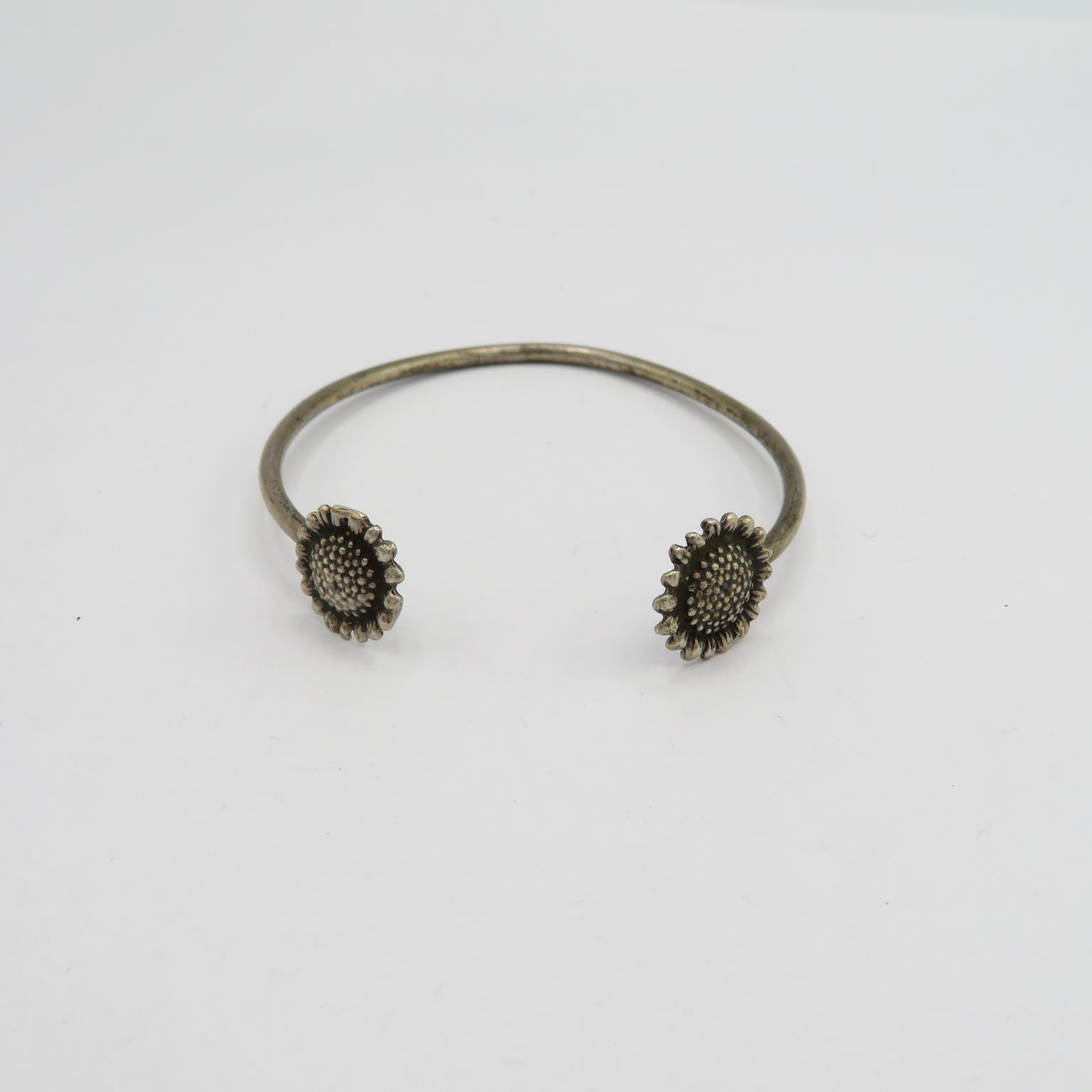 2 silver bangles one daisy ending and one dolphin ending 20.5g - Image 5 of 7