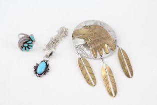 A collection of silver Native American jewellery including Virgil Reeder (32g)