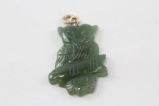 8ct gold bail carved nephrite owl pendant (5.2g)