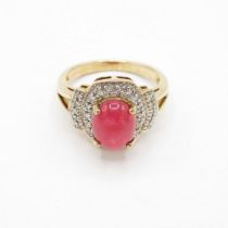 HM 9ct gold dress ring with ruby cabochon centre stone and diamond halo (4.6g) Size N1/2