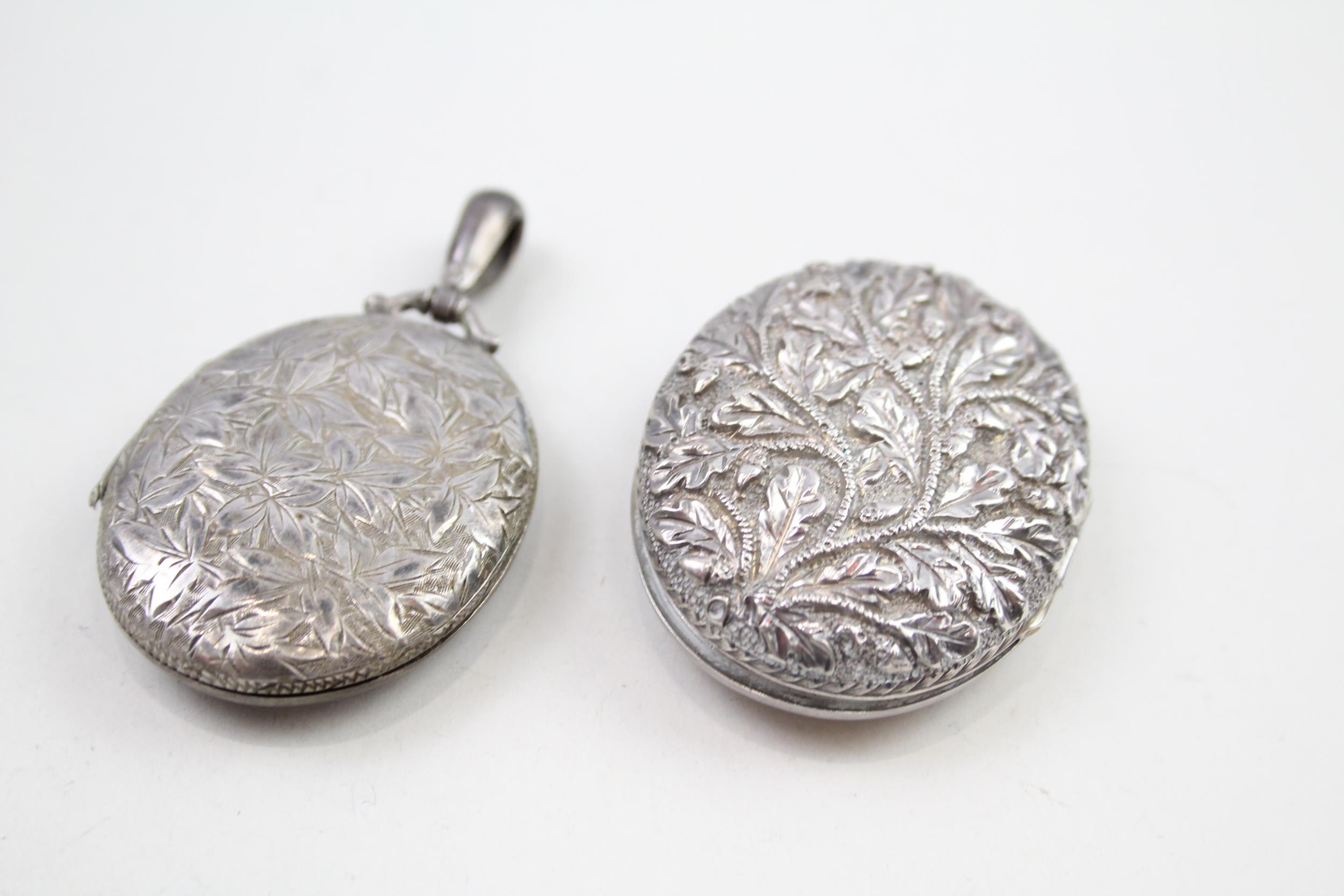 Two silver antique locket pendants (28g)