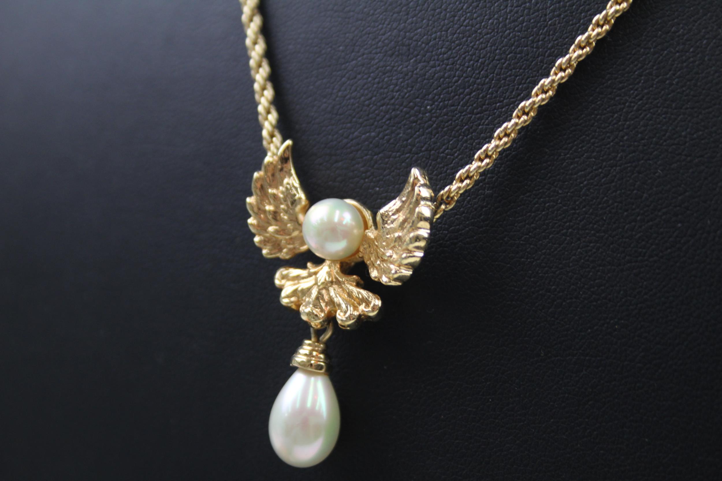 Gold tone wing pendant necklace by designer Christian Dior (14g) - Image 4 of 5