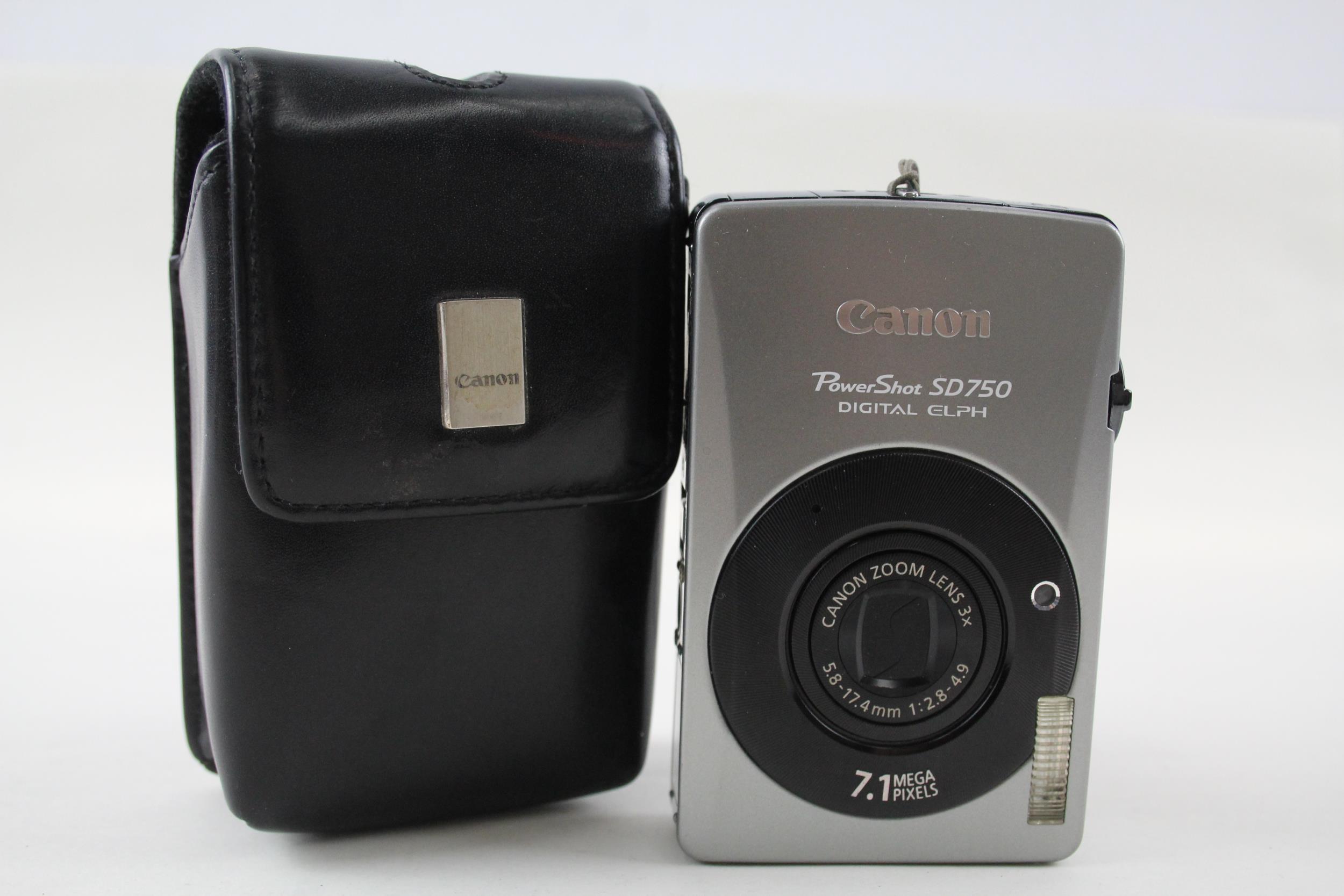 Canon Powershot SD750, DIGITAL COMPACT CAMERA w/ Case WORKING // Canon Powershot SD750 Digital