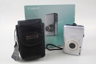 Canon IXUS 105 zoom lens camera in box with accessories and carry case //