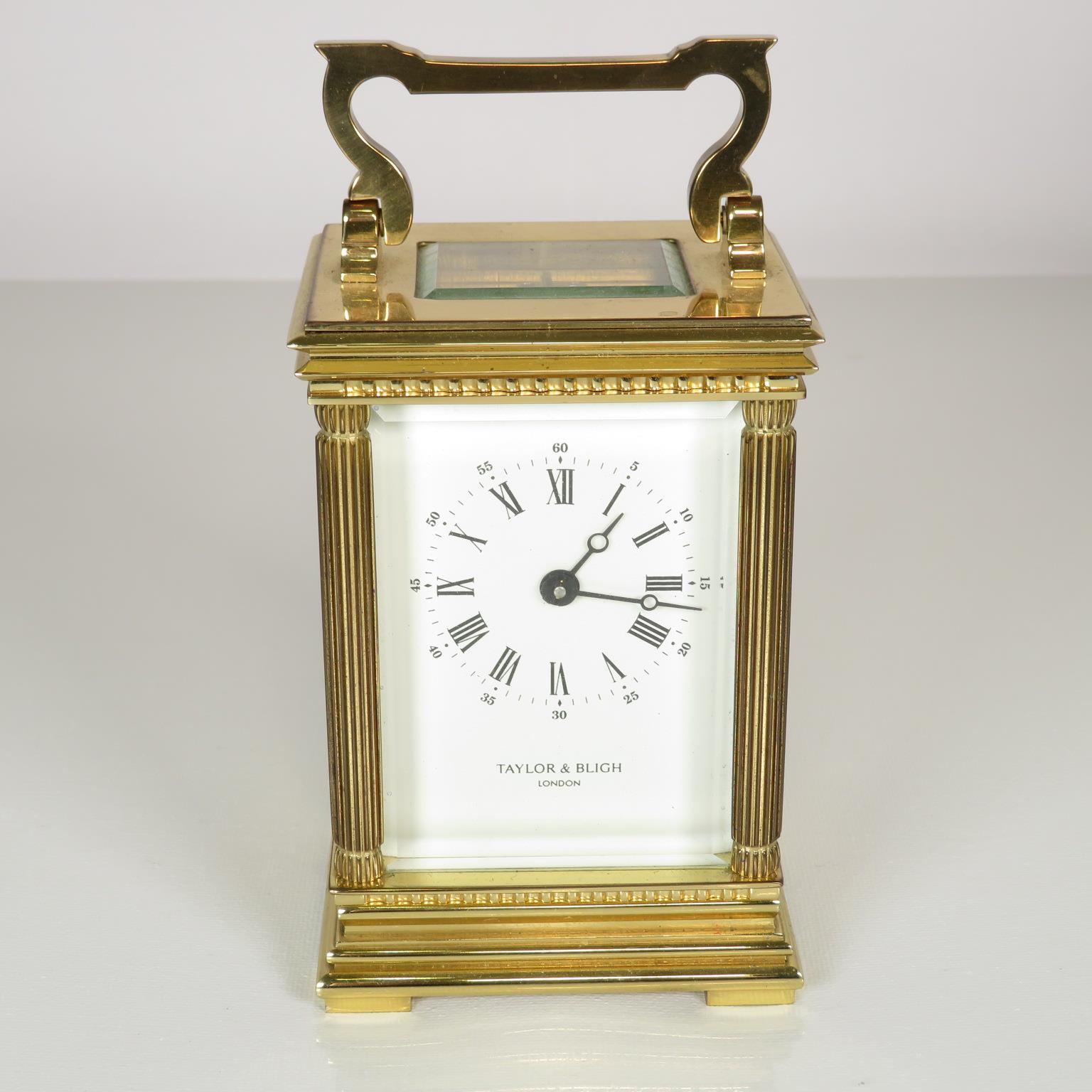 Mid sized carriage clock by Taylor and Bligh of London clock runs 125mm x 85mm //