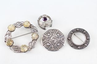Four silver Scottish brooches including Glasgow hallmark (49g)