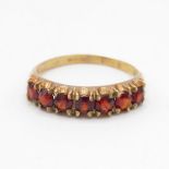 9ct gold 1970's garnet half eternity ring (2g) Size N