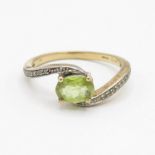 9ct gold oval cut peridot & diamond dress ring (2.3g) Size Q