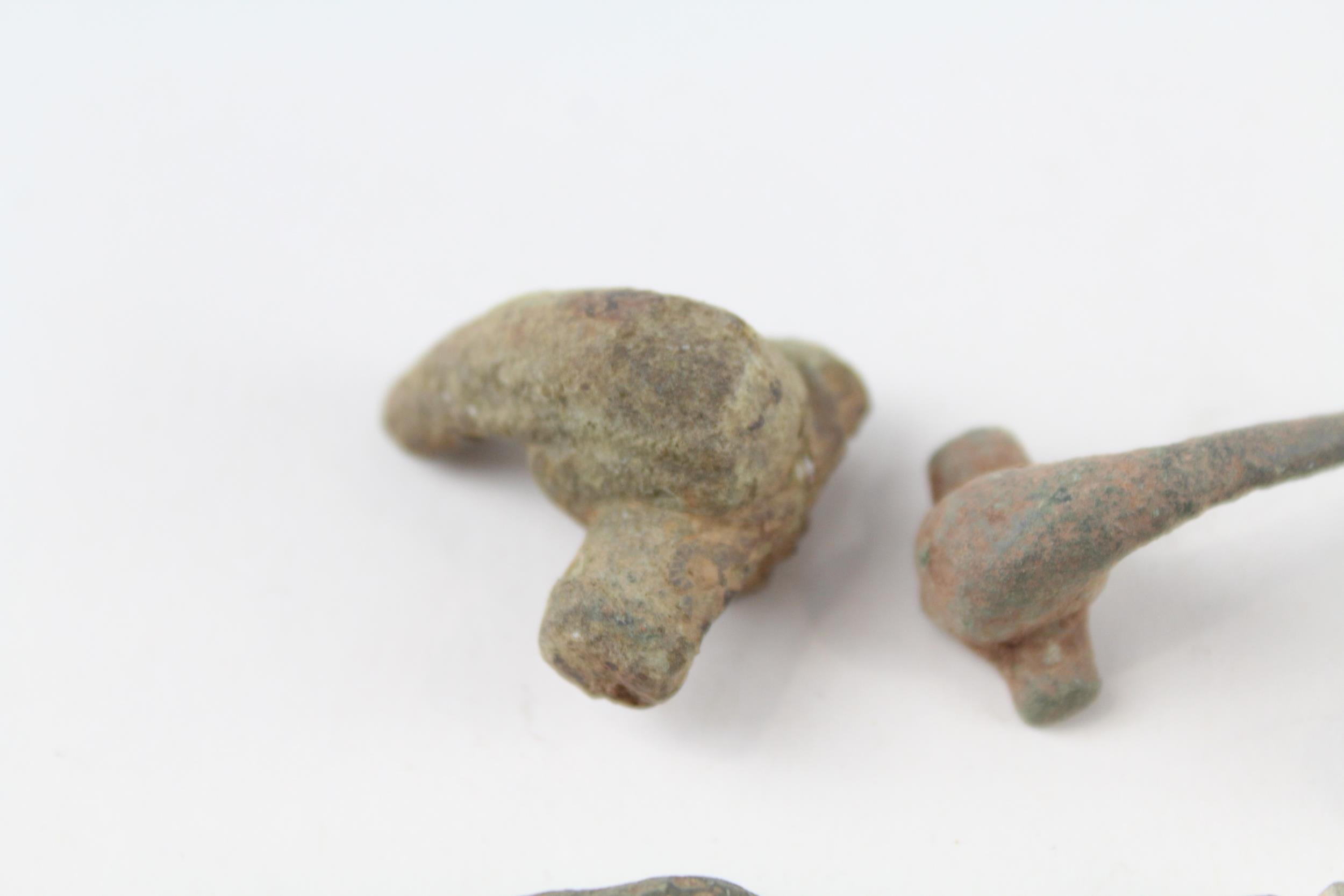 A collection of partial Roman trumpet brooches archaeological metal detectorist finds (g) - Image 2 of 6