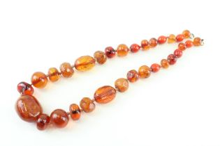 9ct antique enhanced amber & early plastic necklace (42.3g)