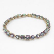 9ct gold vari-cut mystic topaz bracelet, claw set (12.2g)