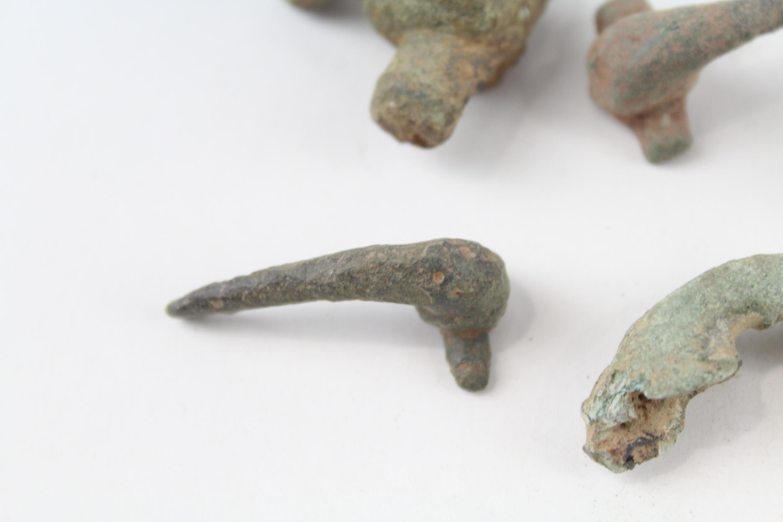 A collection of partial Roman trumpet brooches archaeological metal detectorist finds (g) - Image 3 of 6