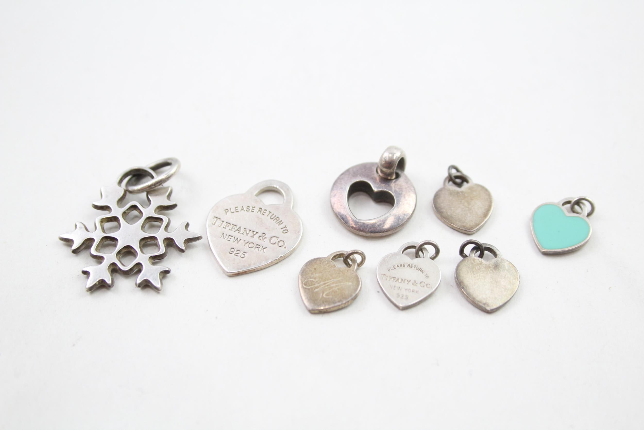 A collection of silver pendants by Tiffany and Co (13g)